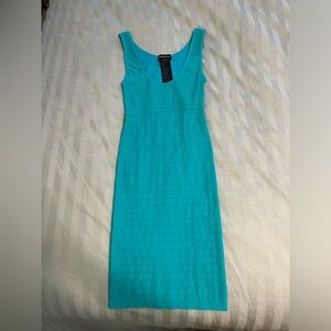 Bebe dress size small- cutout back bodycon turquoise blue. Never worn!